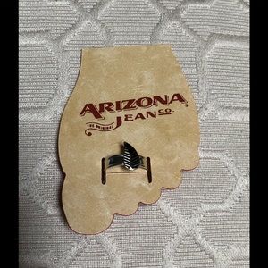 Adjustable leaf motif silver tone toe ring.